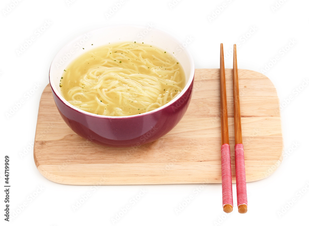 asian noodles in bowl on wooden board isolated on white asian noodles in bowl on wooden board isolated on white