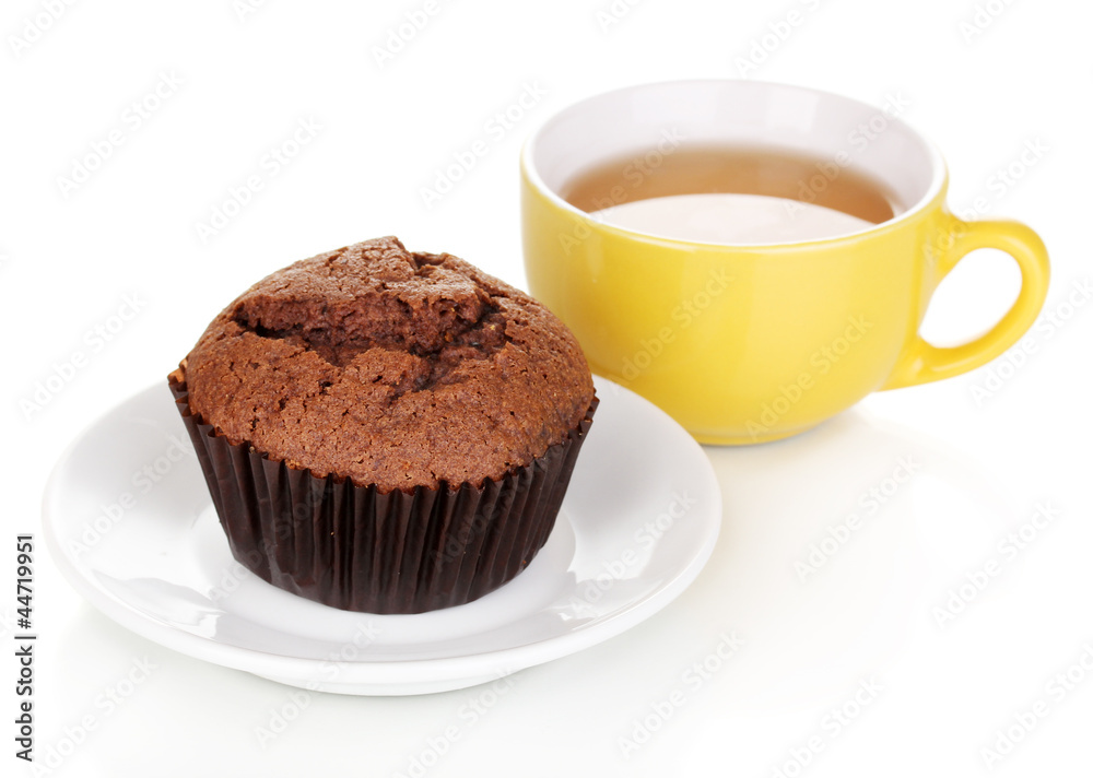 Fresh muffin with tea isolated on white Fresh muffin with tea isolated on white