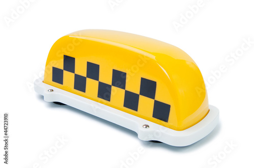 Horizontal shot of a yellow taxi sign isolated over white