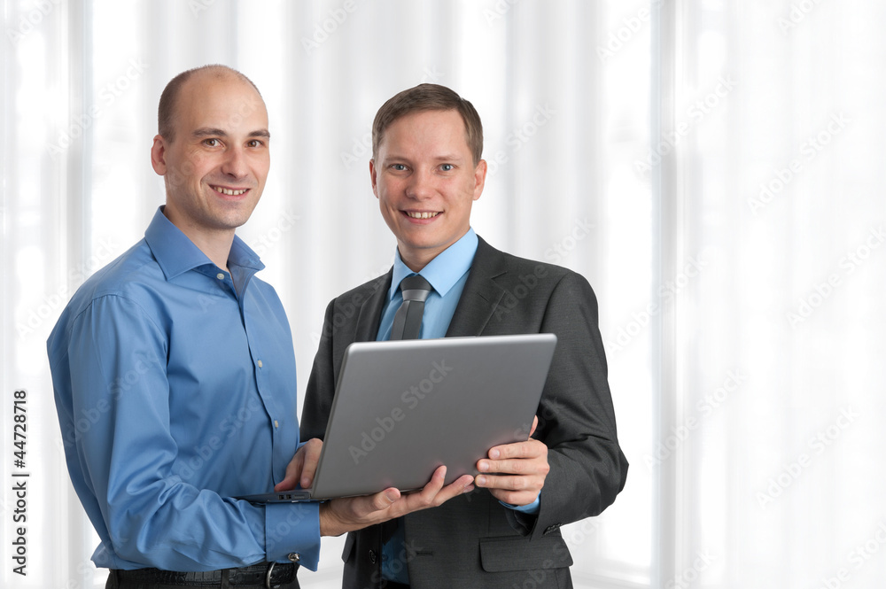 Two business men with laptop Two business men with laptop