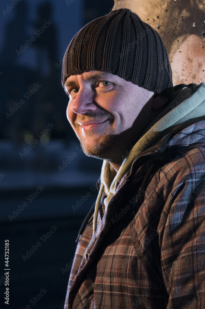 Fototapeta premium grinning man in the night