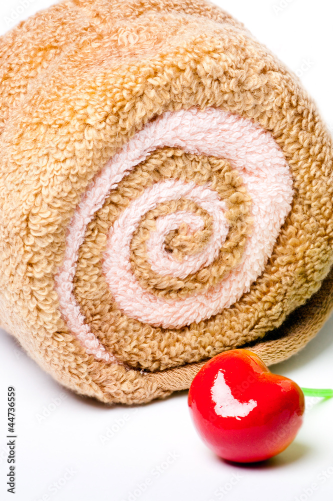 Fototapeta premium Spa concept, towel roll and sweet cherry berry