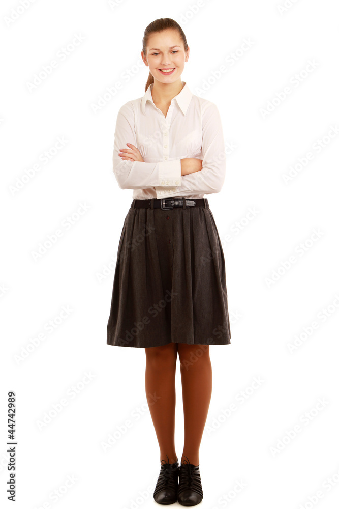 A beautiful woman standing with her arms crossed A beautiful woman standing with her arms crossed