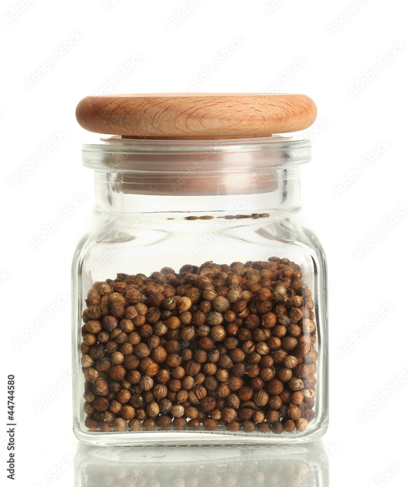 Jar of coriander seeds isolated on white Jar of coriander seeds isolated on white