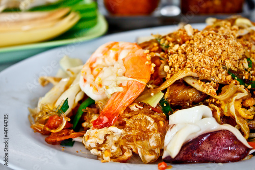 Thai fried noodle or Padthai with prawn and squid photo