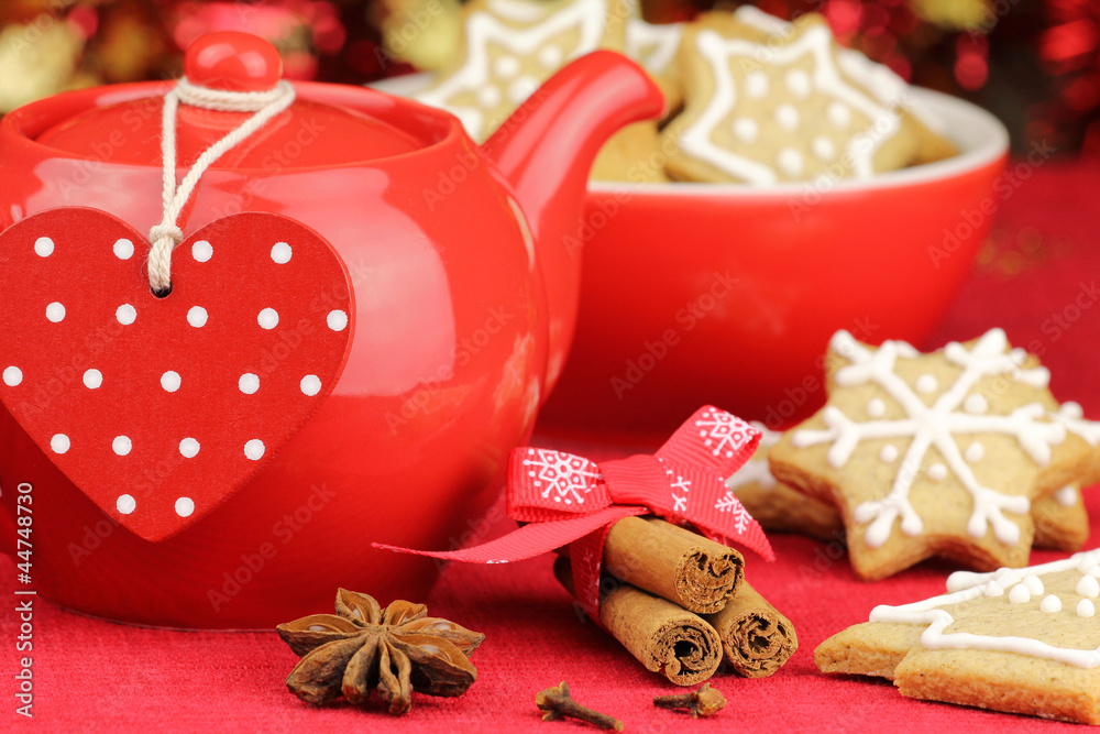 Red Christmas setting with biscuits and teapot Red Christmas setting with biscuits and teapot