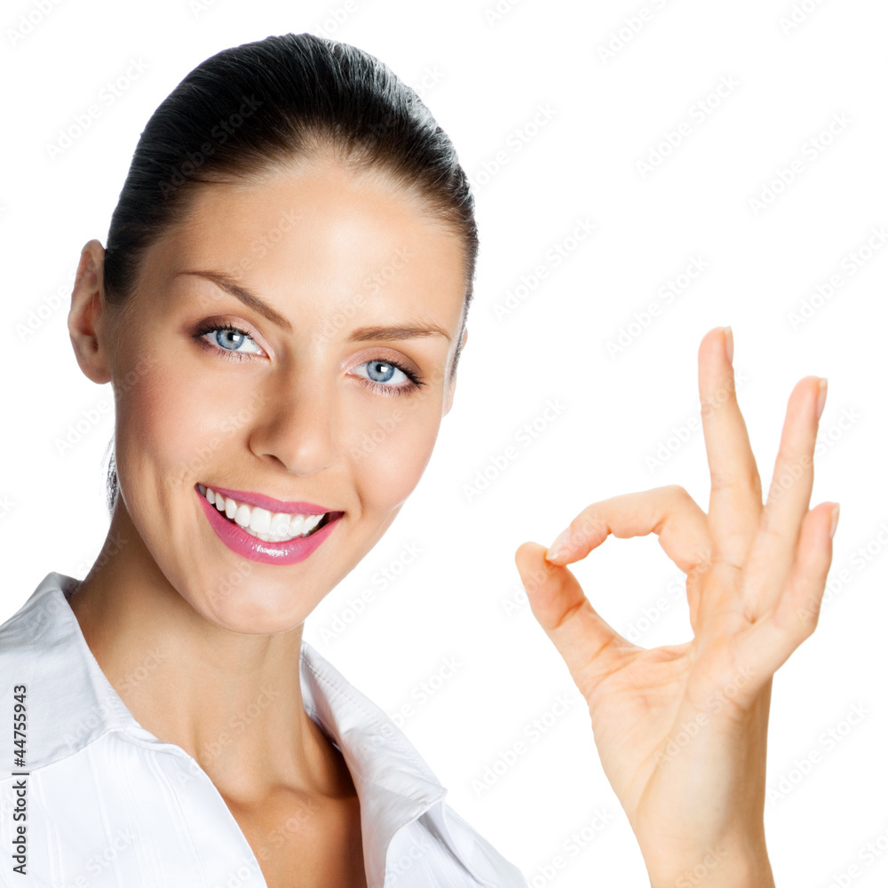Cheerful businesswoman with okay sign, over white Cheerful businesswoman with okay sign, over white
