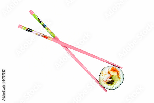 Isolated sushi with pink chopsticks