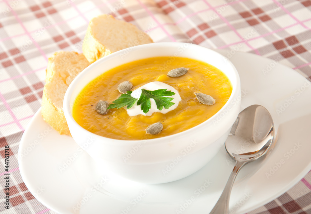 Cream of pumpkin soup with sour cream sauce Cream of pumpkin soup with sour cream sauce
