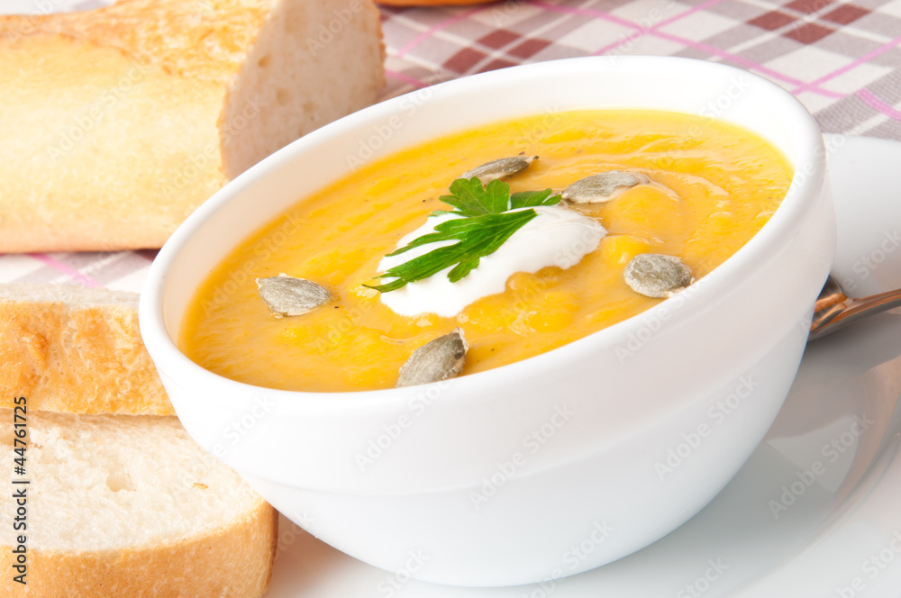 Cream of pumpkin soup with sour cream sauce Cream of pumpkin soup with sour cream sauce
