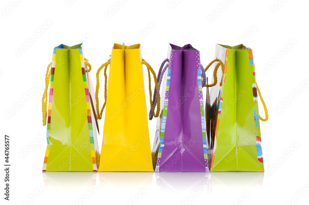 Four colored gift bags