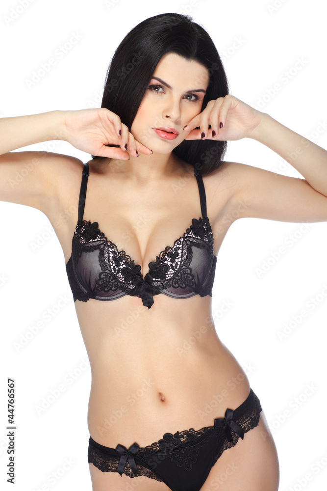 Attractive sexual brunette in lingerie on a white background Attractive sexual brunette in lingerie on a white background