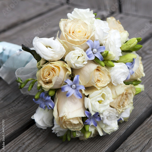 Wedding bouquet of yellow and white  roses