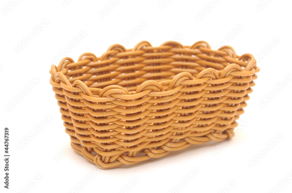 Empty wicker basket. Isolated over white