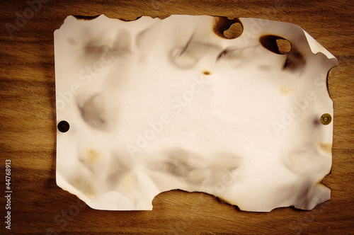 Obraz na płótnie Old paper on wooden background w salonie