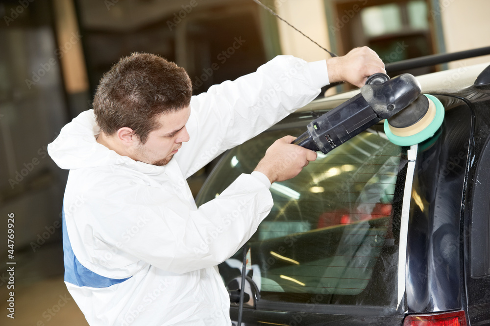 auto mechanic polishing car auto mechanic polishing car