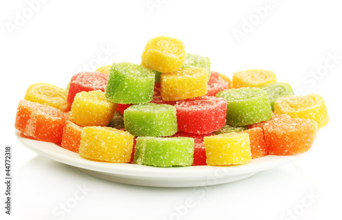 colorful jelly candies on plate isolated on white.