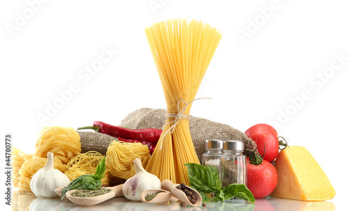 Pasta spaghetti, vegetables and spices, isolated on white