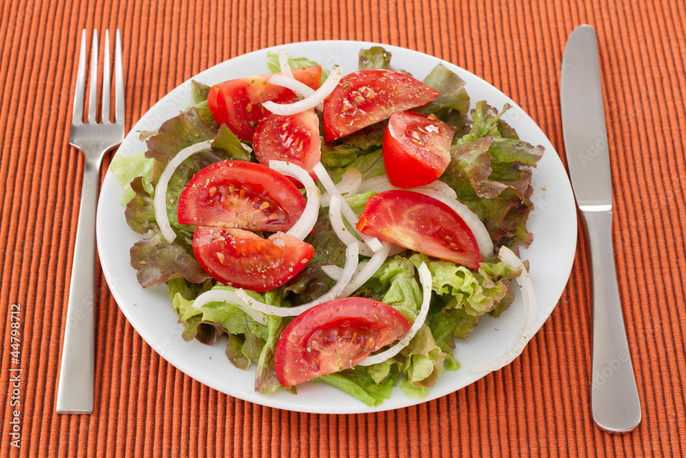 vegetable salad on the white plate