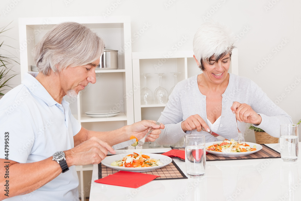 Senior couple eating a meal