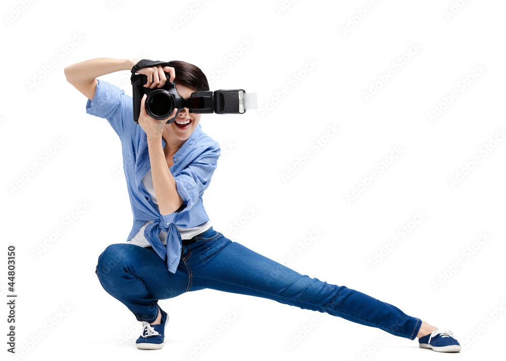 Lady-photographer takes snaps, isolated on white Lady-photographer takes snaps, isolated on white