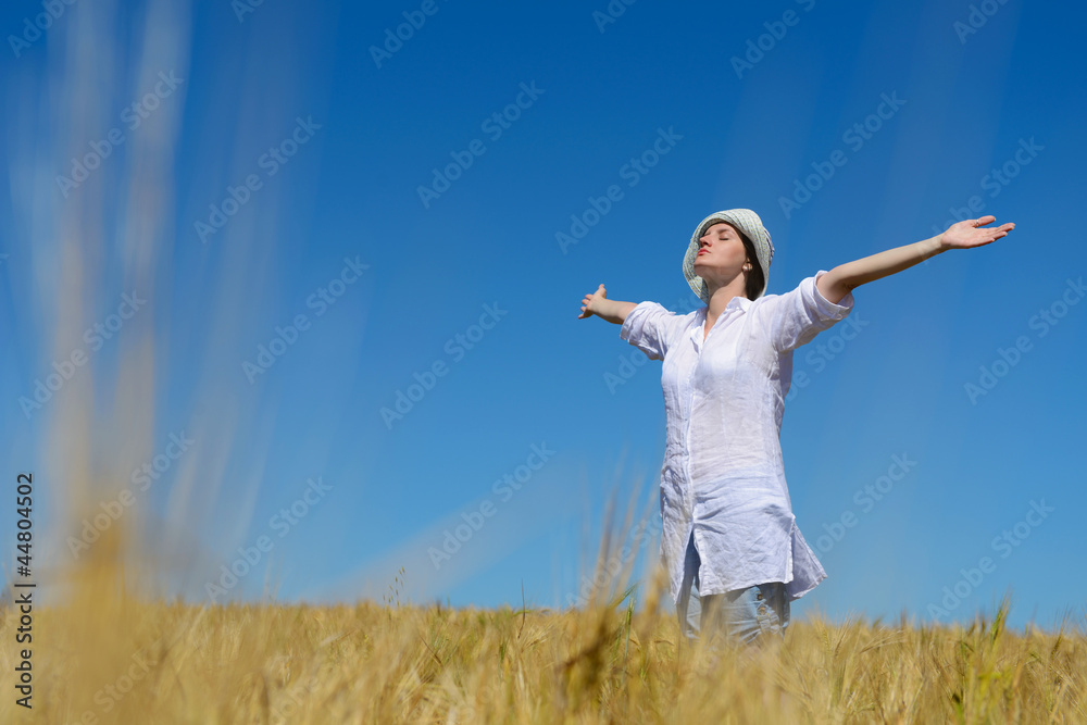 young woman in wheat field at summer young woman in wheat field at summer
