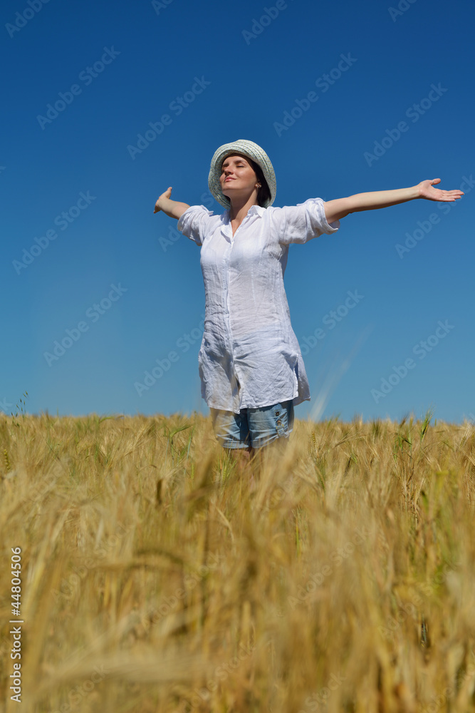 young woman in wheat field at summer young woman in wheat field at summer