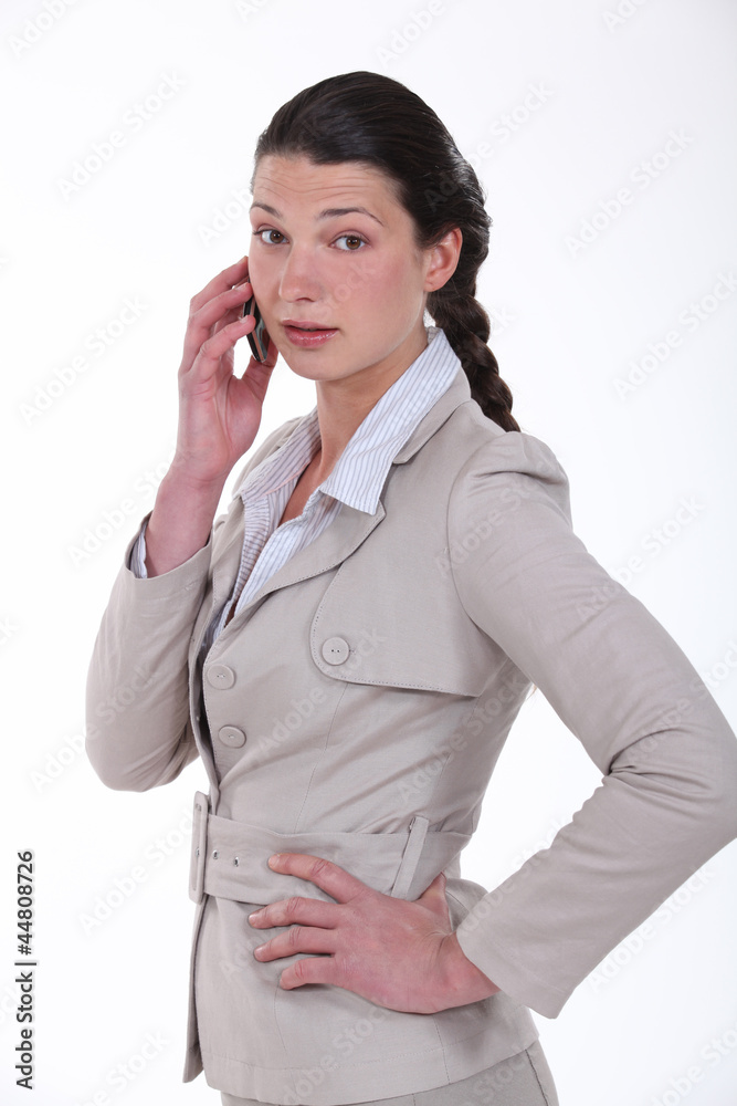 businesswoman talking on her cell businesswoman talking on her cell