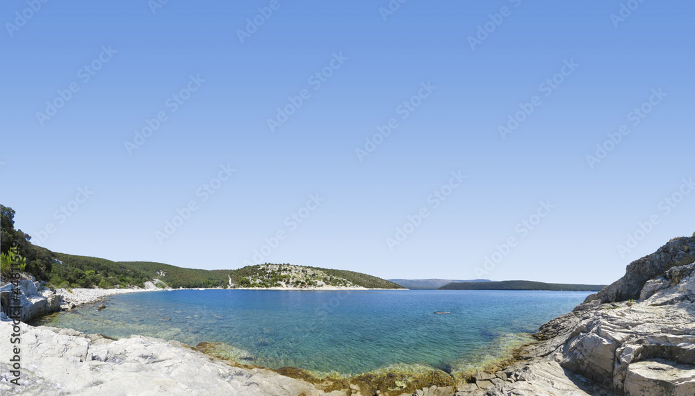 panoramic view of a beautiful rocky beach in croatia, blue sea panoramic view of a beautiful rocky beach in croatia, blue sea