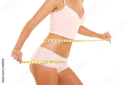 happy woman with measure tape