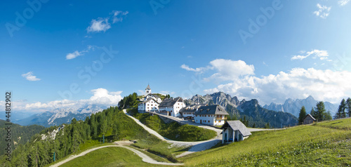 Tableau sur toile panoramic view of monte lussari, small mountain village, italy