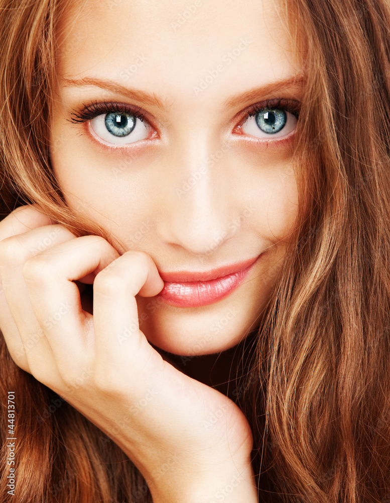 Portrait of a young woman with beautiful hair and blue eyes Portrait of a young woman with beautiful hair and blue eyes