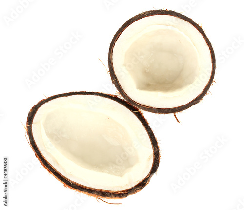 halves of coconut isolated on white background close-up