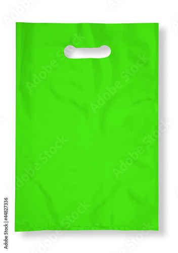 Green plastic bag on white (clipping path)