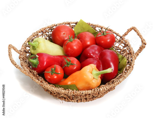 Basket full pf riped vegetables pepper, and tomato