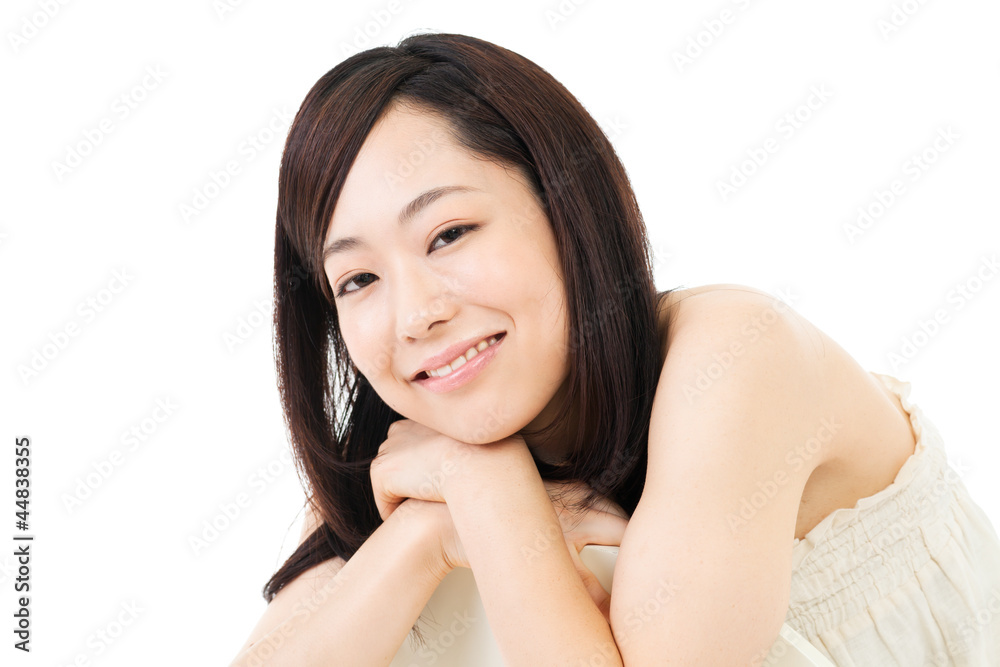 Beautiful young woman relaxing on white background. Portrait of Beautiful young woman relaxing on white background. Portrait of