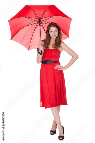 Woman with red umbrella © Andrey Popov