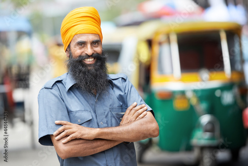 Indian auto rickshaw tut-tuk driver man photo