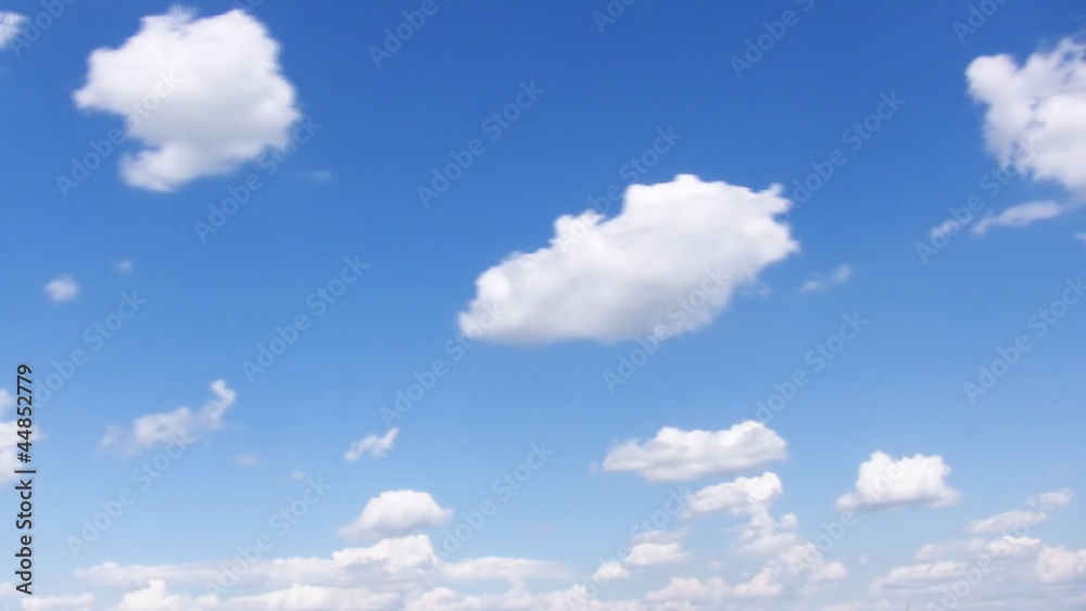 clouds on blue sky. timelapse