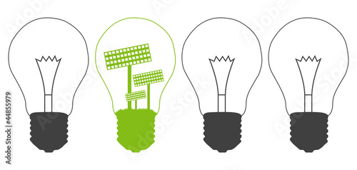 Light bulb and solar panel inside. Alternative energy concept ba