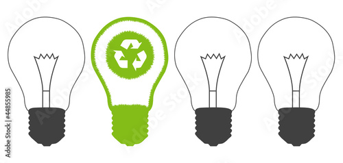 Green grass light bulb and recycle round inside. Recycling conce