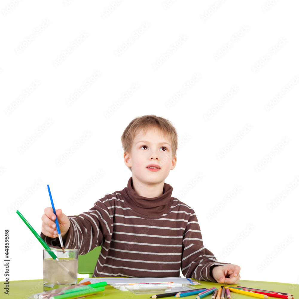 closeup image of the cute little boy painting closeup image of the cute little boy painting