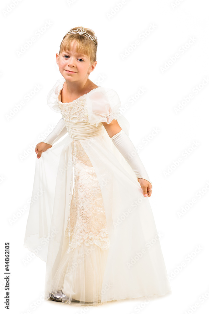 Beautiful little dancer wearing princess dress isolated over whi Beautiful little dancer wearing princess dress isolated over whi