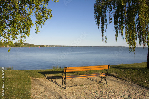 Beach of Balatonkenese with a bench