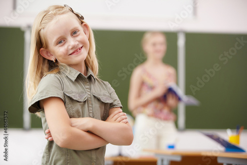 Little girl at school class