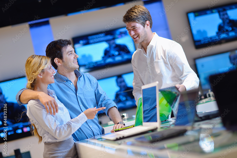 Obraz premium people buy in consumer electronics store