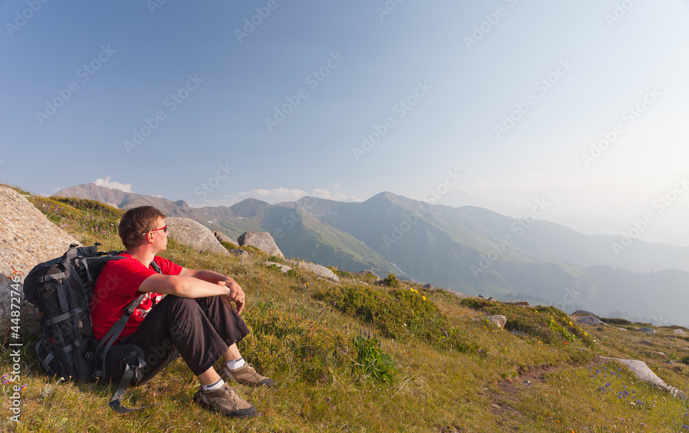 Young man relaxing after hiking.
