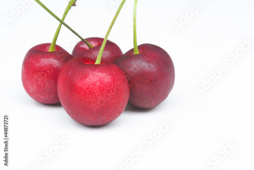 fresh red cherry close up isolate on white background