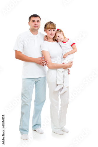 Happy young family isolated on white background