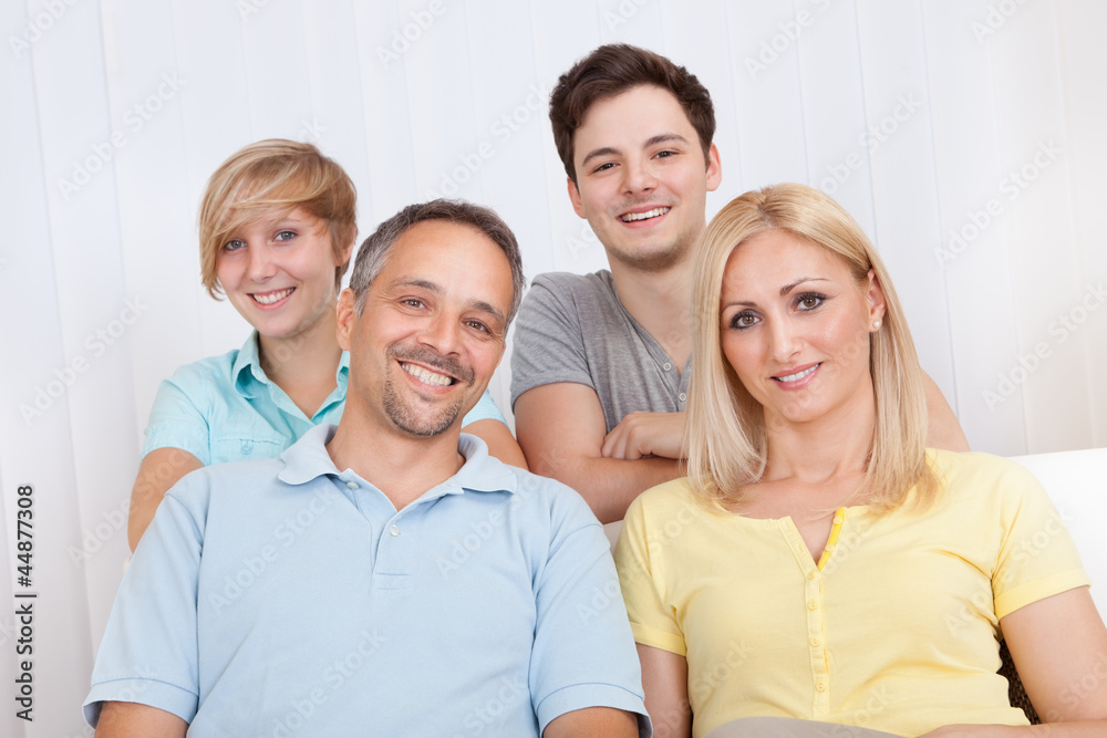 Smiling family in group portrait Smiling family in group portrait